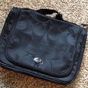 Coach toiletries bag